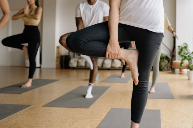 Young and old are doing yoga