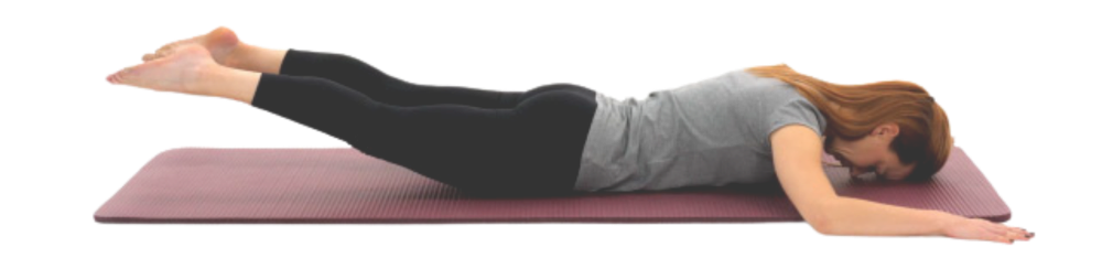 A woman lying on a yoga mat