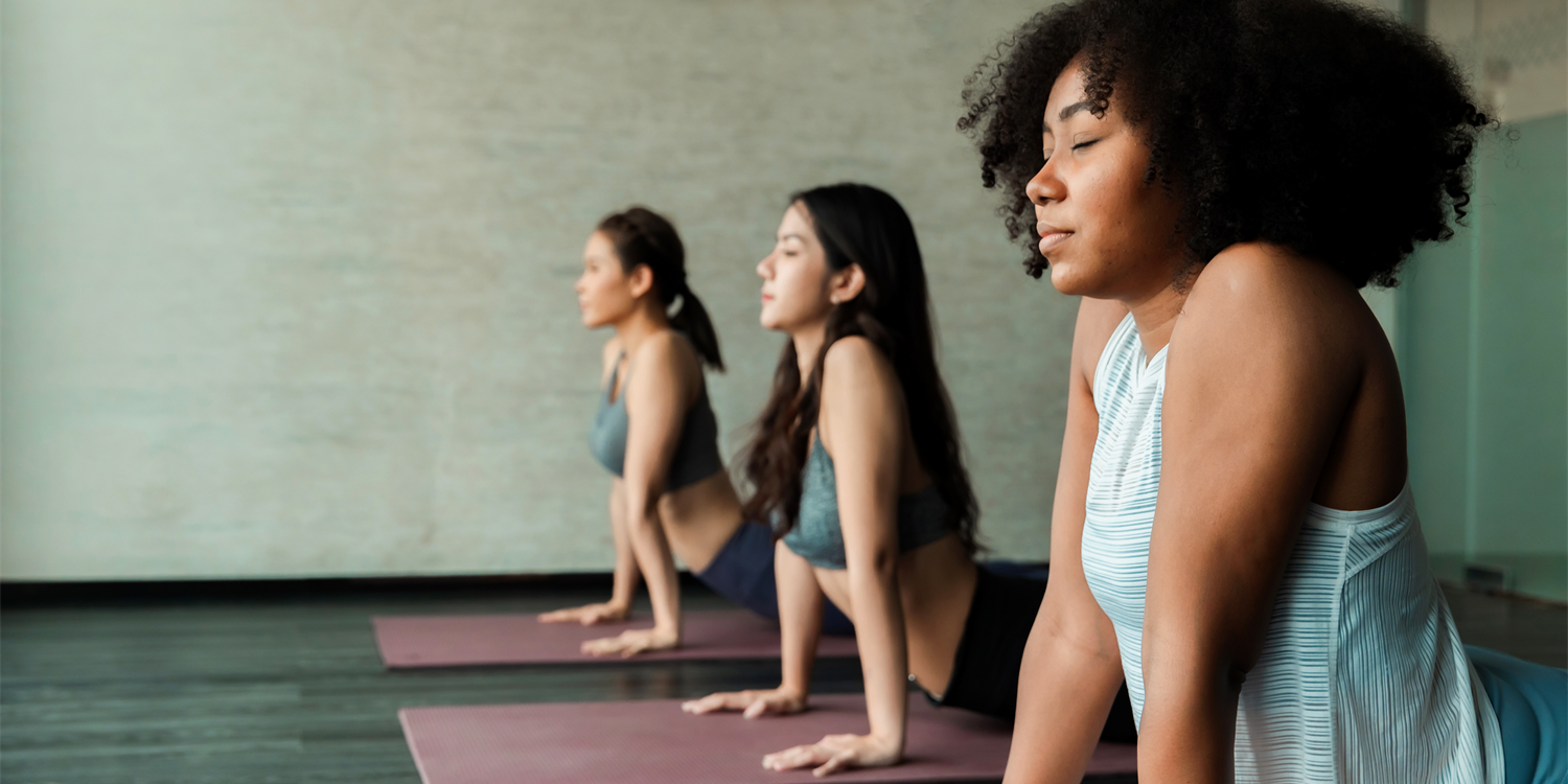 Banner of several ladies doing yoga